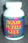Jigsaw-puzzle glue is available at craft stores. I got mine for twenty-five cents at a garage sale.