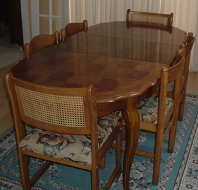Although the chairs are quite dissimilar at first glance, they blend together as a set at the dining-room table.