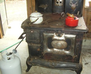 The converted cook-stove works great in Carmen’s summer kitchen. You can see that the kitchen has plenty of ventilation--a requirement when using propane indoors.