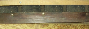 The old leather belt works great as a long-lasting door-sweep.