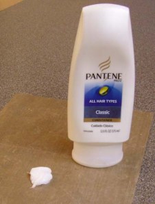 (1) Squeeze out the desired portion of conditioner, in individual dollops, onto a Teflon craft/baking sheet or other nonstick surface. Spread each dollop into as flat a circle as possible.