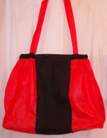 The vertical stripe of black cotton fabric hides the bag’s logo.