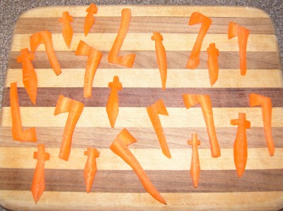 4. The resulting axes and swords (or sevens and crosses, if your progeny prefers) can be precooked to the tender-crisp stage before being added to the package of frozen peas and carrots.